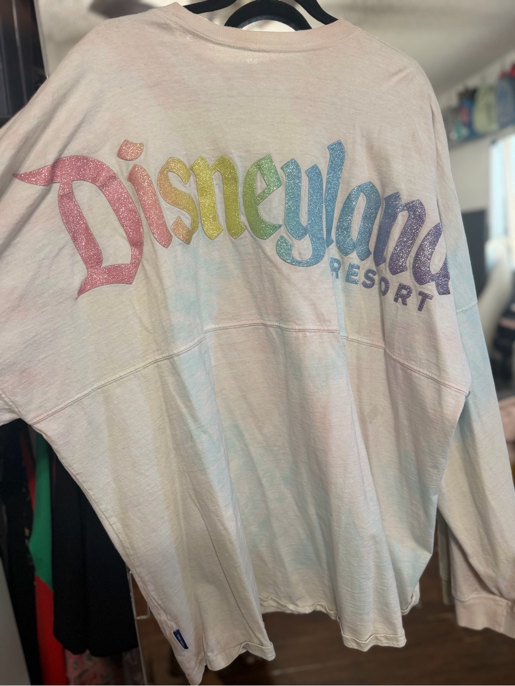 A Disney spirit jersey photographed for a US resale marketplace listing in September 2026